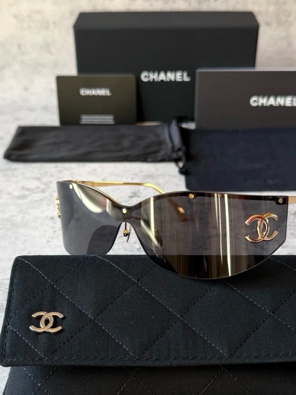 CHANEL Black Shield Sunglasses with Gold CC Emblem